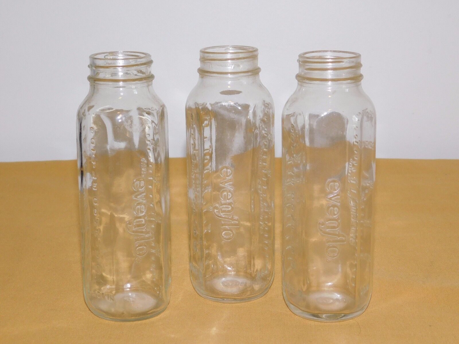 Vintage 3  6 1/2" High Evenflo  8 Oz Glass Baby Bottles